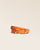 Notre ceinture Marina en cuir façon vigogne orange vu de face en studio.