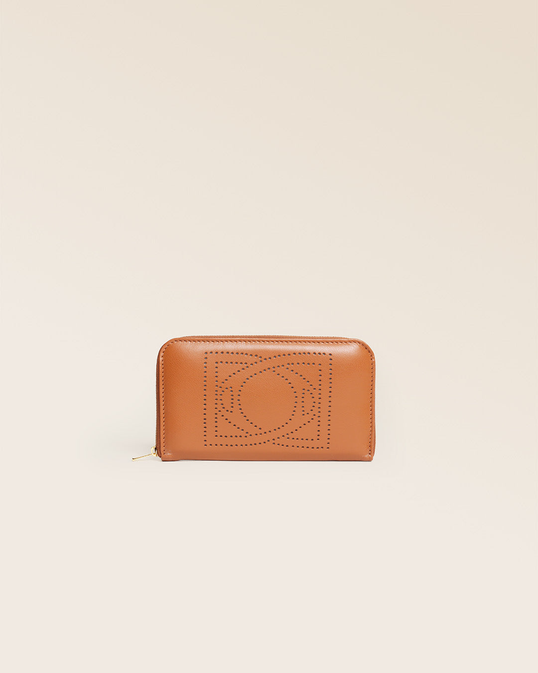 Notre porte-monnaie Étrivière en cuir vintage camel vu de face en studio.