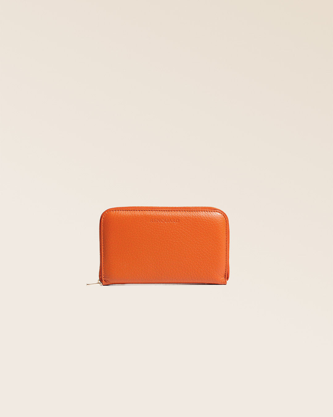 Notre porte-monnaie Samba en cuir façon vigogne orange vu de face en studio.