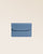 Notre porte-papiers Aurore en cuir façon vigogne bleu cobalt vu de face fermé en studio.