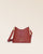 Notre sac Cob Renouard dans sa version Mini modèle, cuir façon vigogne  terracotta et bandoulière cuir ; vu de face en studio.