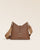 Notre sac Cob Renouard dans sa version Petit modèle, cuir façon vigogne fauve et bandoulière coton ; vu de face en studio.