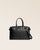 Notre sac de voyage Escapade petit modèle en cuir façon vigogne noir vu de face en studio.